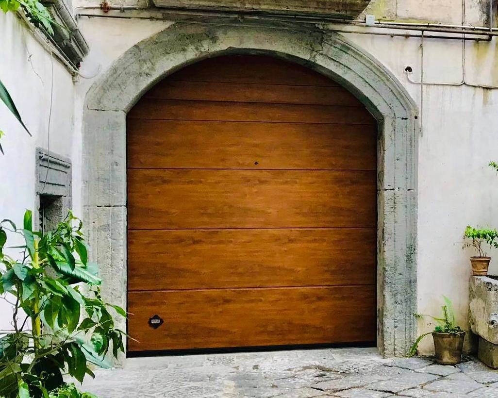 portone sezionale per garage legno